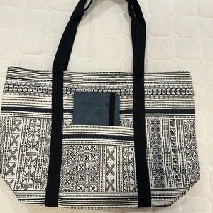 Never used Navy and White, zippered tote bag. Made in India